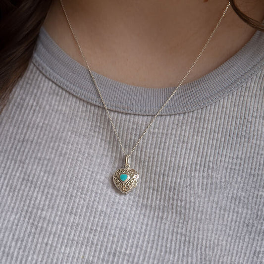 Sterling silver locket with turquoise stone