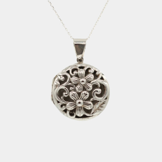 Large silver locket with flower detail
